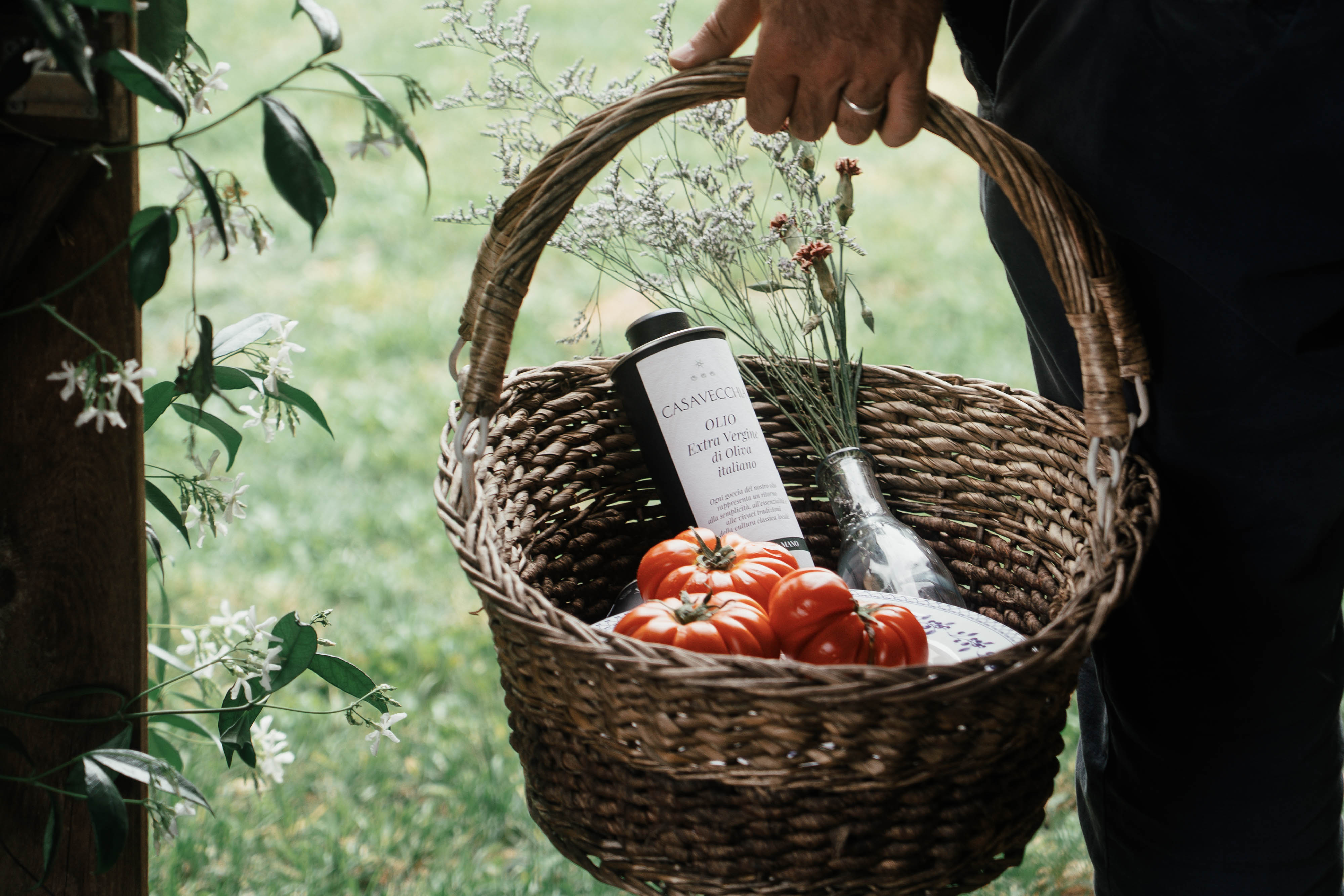 Fresh produce basket with olive oil